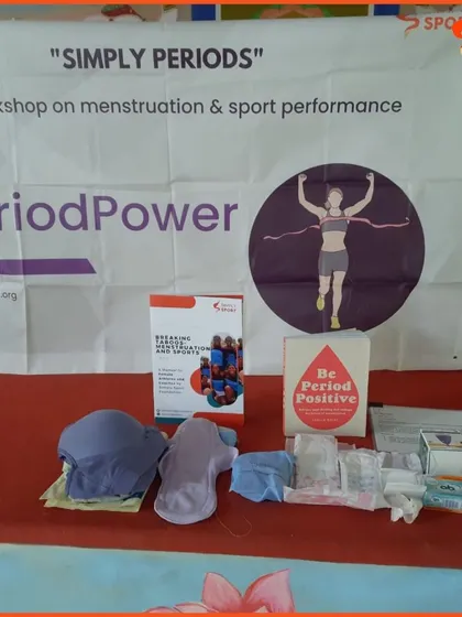 A close-up of the educational materials and period products displayed at our workshop. We showcase a variety of options, including reusable pads and menstrual cups, to provide comprehensive information.