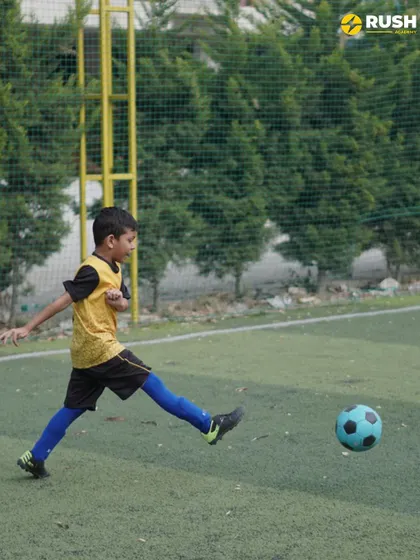 A player takes a shot on goal during practice.