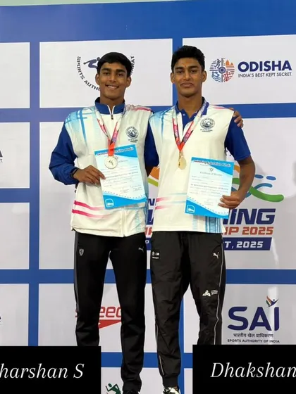 The BAC twin brothers, Dharshan S and Dhakshan S, on the podium together.