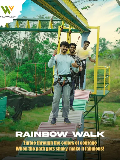 Friends cheer each other on while crossing the Rainbow Walk, a wobbly and colorful rope bridge. It’s a great test of balance and courage, and always results in a lot of laughs.