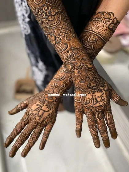 A beautiful crossed-hands pose showing the personalized design for 'Abdullah'.