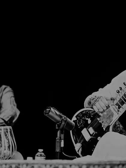 A black and white photo with my tabla player, capturing the classic duet format.