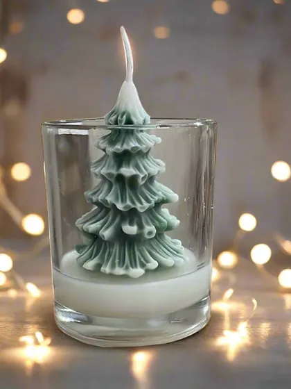 Illuminate the holiday season with this Christmas tree candle. It not only adds a cozy ambiance but also fills the air with the soothing scent of pine.