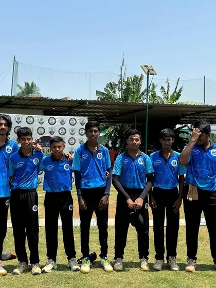 A team in blue jerseys stands together for a group photo during the RSCA League.