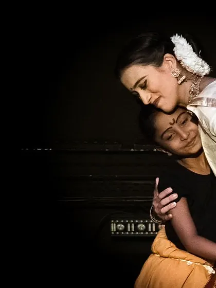 The connection between a guru and shishya is precious. In this moment from a performance, I share a story with one of my youngest students, passing on the art of abhinaya (expression) through a gentle embrace.