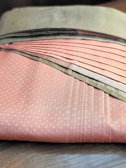 The final folded saree, ready for the client. This service is perfect for maintaining expensive silk sarees.