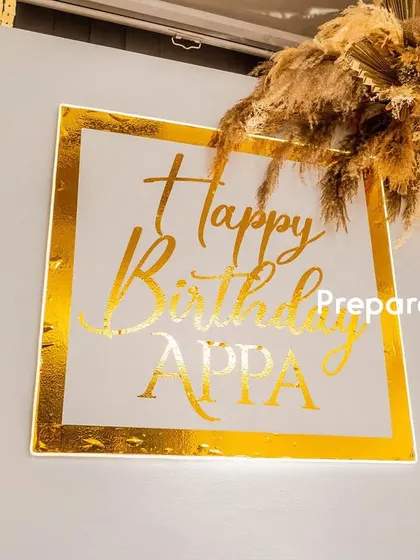 For a 70th birthday, I focus on creating a distinguished and celebratory atmosphere. This includes coordinating the main decor with the dining setup and even a personalized cake.