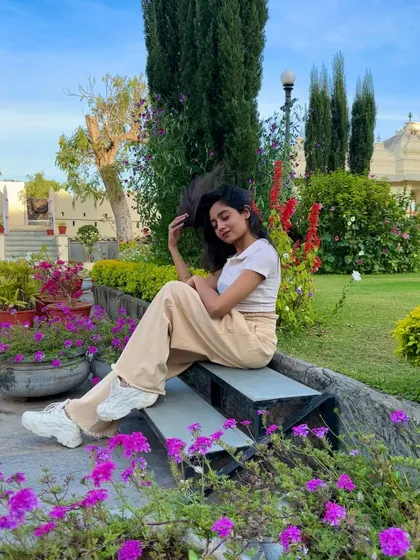 A relaxed moment in a serene garden. It's important to find quiet spots to recharge during our travels.
