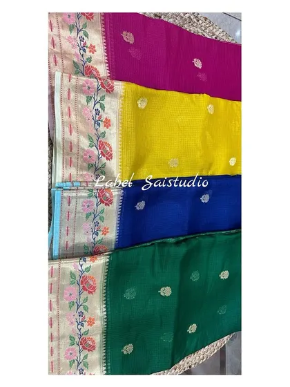 An exclusive pure Kota Zari silk saree with a beautiful Paithani border. This saree is very soft, easy to drape, and comes with a tissue pallu and a rich designer blouse.