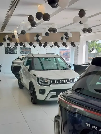 Another angle of the NEXA showroom in Nerul, showing how our decorations complement the new car models on display. Our goal is to create an exciting environment for customers celebrating a new purchase.