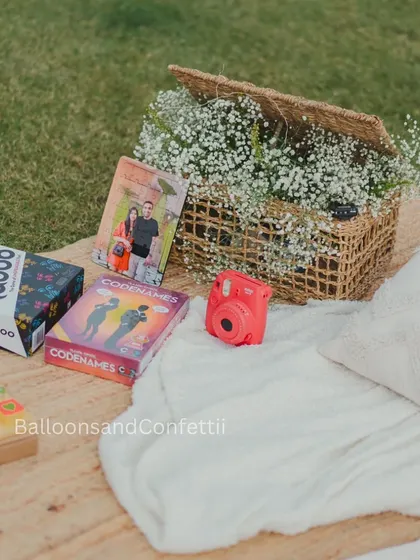 Fun and games are a must for a picnic. I always include things like board games and a Polaroid camera to help create lasting memories.