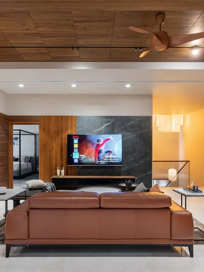 A similar perspective of the family room, emphasizing the flow into the adjacent bedroom. The design ensures that even distinct spaces feel connected, creating a harmonious living experience.