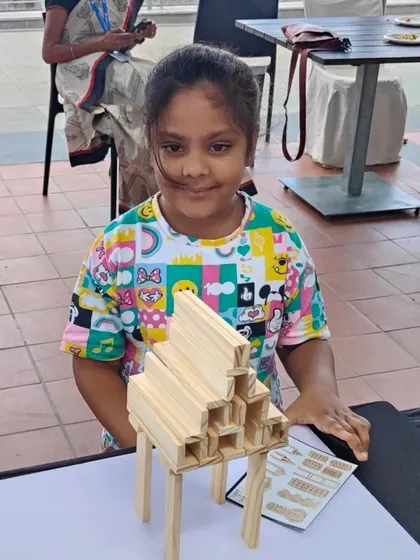 It's pure joy to see children so engrossed, building bridges between mindsets and communities. They quickly identify patterns and use their innate curiosity to construct amazing things, turning simple planks into expressions of their imagination.