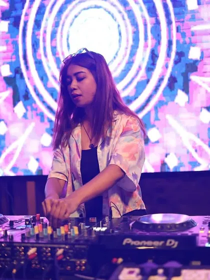 At the console with a vibrant, pulsating visual backdrop. I believe the visuals are just as important as the sound for a full psychedelic experience.