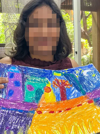 This student explored warm and cool colors to create a vibrant cityscape at night. Art is a language everyone can speak, and this piece beautifully expresses a mood through color.