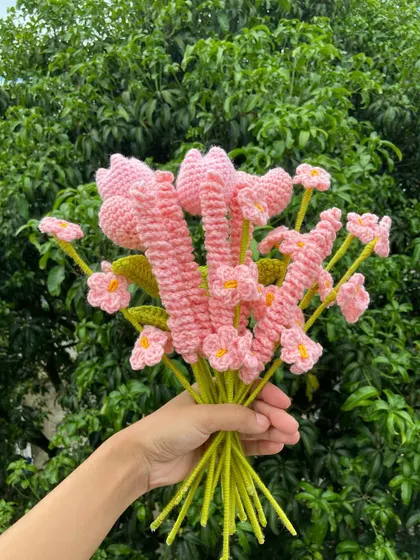 A lovely pink-themed bouquet with a mix of different flower shapes.