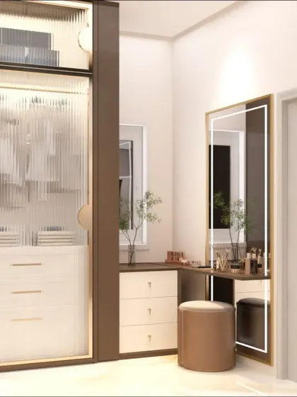 A dressing table is a personal stage. We designed this corner with an illuminated mirror and organized drawers, creating a functional and glamorous spot for your daily rituals.