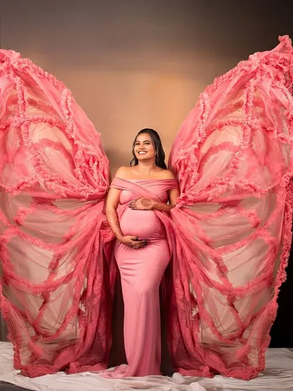 Our popular butterfly wings effect, created in the studio with a beautiful pink gown for a touch of fantasy and art.