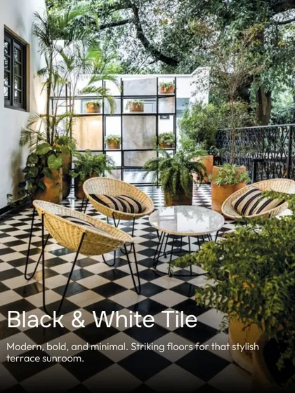 For a modern, bold, and minimal sunroom, you can't go wrong with black and white checkerboard tiles. They create a stylish and striking floor for a terrace or semi-outdoor space.