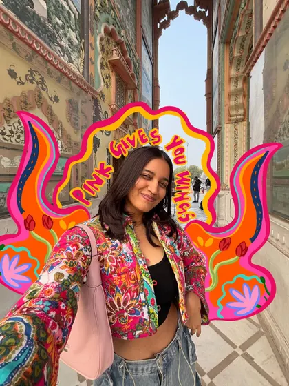 "Pink gives you wings." A selfie in Jaipur's city palace, with a vibrant, truck-art inspired doodle.