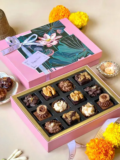 A full view of the 16-piece mini brownie box from my Diwali collection. The elegant pink and floral packaging makes it a gift that looks as good as it tastes.
