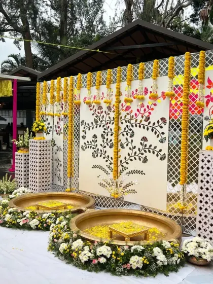A rainy day Haldi setup, where the vibrant colors of the decor shine even brighter, creating a magical atmosphere.