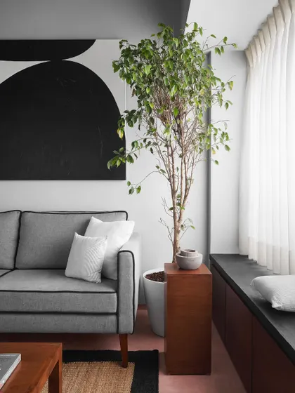 A living room I designed, featuring a custom sofa and window seat. This space is all about creating comfortable, light-filled areas for the family to relax and enjoy their home.