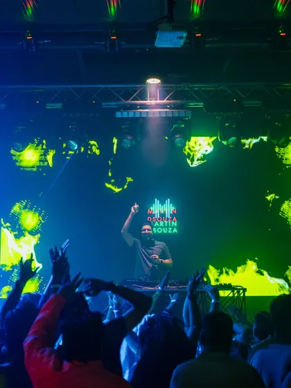 A wide shot showing me commanding the stage and the crowd.