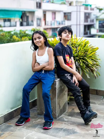 An outdoor shot for the kids' fashion campaign. Taking the shoot outside provides a different, more lifestyle-oriented feel to the brand's lookbook.