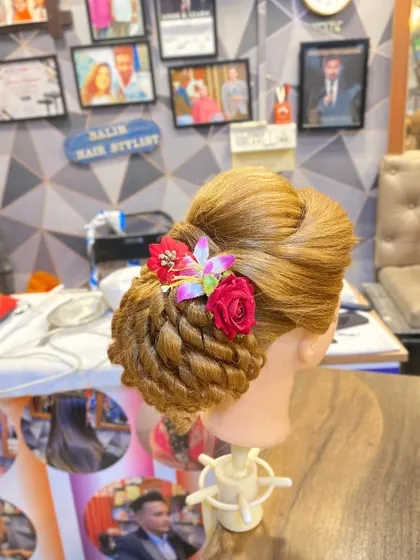 Another angle showcasing the detailed texture of the twisted bun created by one of my students.