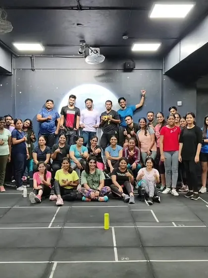 The heart and soul of my classes. Each photo captures a unique moment with my incredible community after a sweaty, joyful session. This is our shared victory lap.