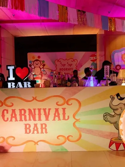 A fully themed "Carnival Bar" for the adults, showing how the theme can be extended to all aspects of the party.