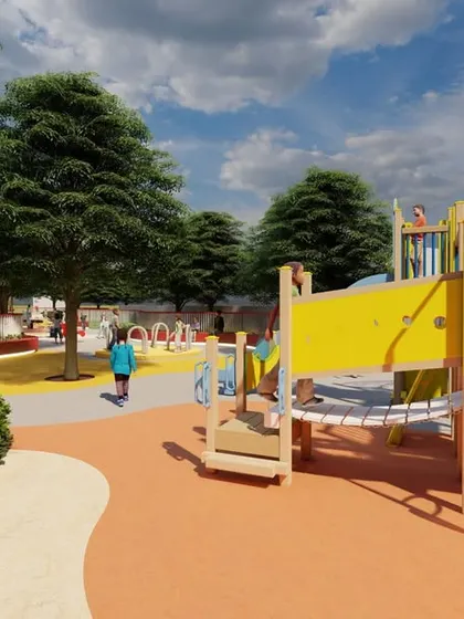 A close-up of the play equipment at New Baldwin School, showing durable, modern structures designed for active play, including climbing frames and slides.