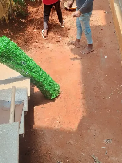 A roll of artificial turf is ready to be installed. I use high-quality, realistic-looking turf for all my projects.
