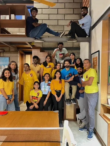 The whole team ready for our annual table tennis tournament, Smash & Dash!