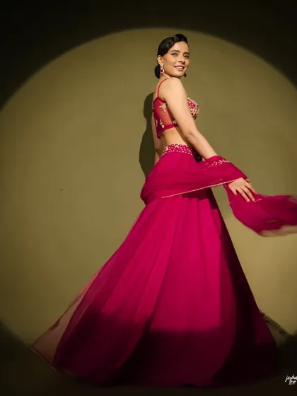 A joyful, twirling shot that shows the makeup in motion. It's important that the look feels comfortable and stays put, no matter how much you dance.