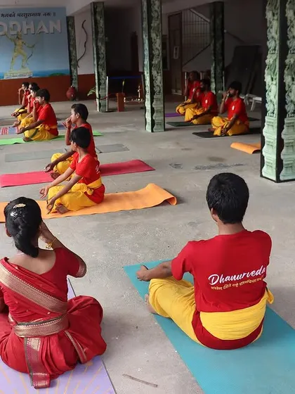 Meditation and pranayama are integral to our daily routine. Here, students practice breathing exercises to calm the mind, improve focus, and develop the mental stillness required for precision archery.