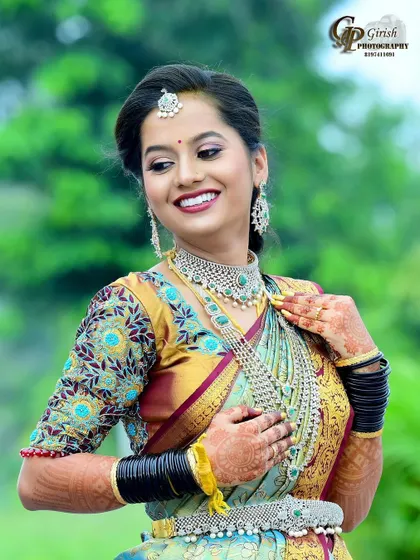 A happy bride on her wedding day, wearing a modern Victorian-style diamond-finish necklace set with a hint of green.