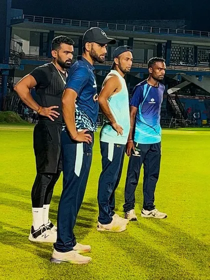 Target set. The team stands together on the field, focused and united. My role is to ensure they are physically prepared to execute their game plan.