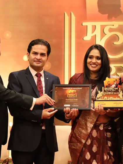 Receiving the certificate of association along with the Maharashtra Ratan Puraskar. It's an honor to be formally recognized for my contributions as a life coach.