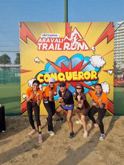 The tribe celebrating their conquest of the Aravali Trail Run. We are a team of conquerors.