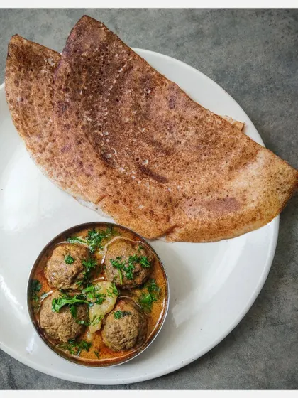 A classic pairing of my Khaima Unde Saaru with a crispy dosa. The contrast between the soft, flavour-packed meatballs and the crisp, fermented crepe is a true delight.