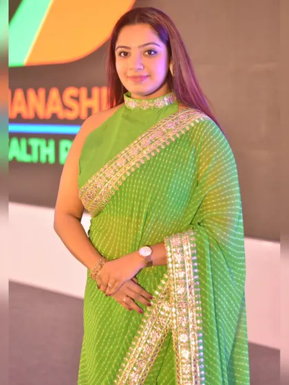 A professional portrait from the Dhanashree Investment event. I chose a green saree to present a look that was both professional and vibrant for this corporate wealth management summit.