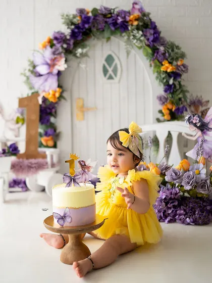 Getting ready to dig into her first birthday cake!