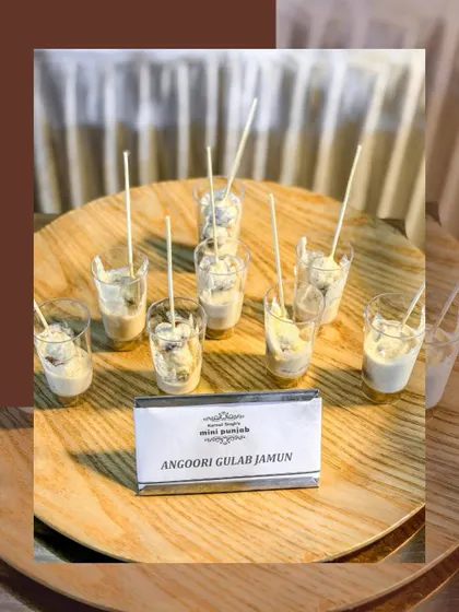 Our Angoori Gulab Jamun offers a modern twist on a classic. These small, grape-sized dumplings are served in individual cups, making them an elegant and easy-to-eat dessert.