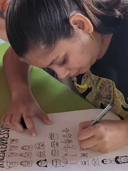 A participant enjoying a relaxing doodling session. It's a great way to let your mind wander and create without pressure.