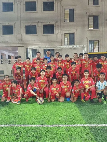 A group photo of our players with Pawan V. Pattem after an inspiring and educational defending session.
