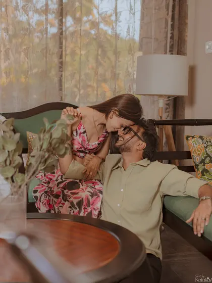 A playful and intimate moment during an indoor shoot, showing that we can create beautiful memories anywhere.