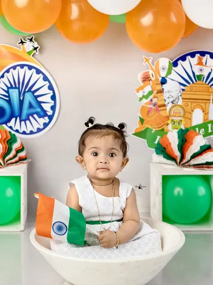 A proud little Indian holding the national flag during her special photoshoot.
