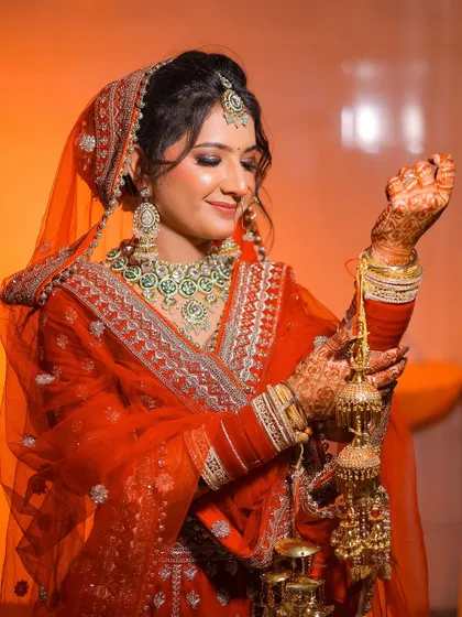 A portrait of the bride holding her kalire, an important part of a Punjabi wedding ceremony.
